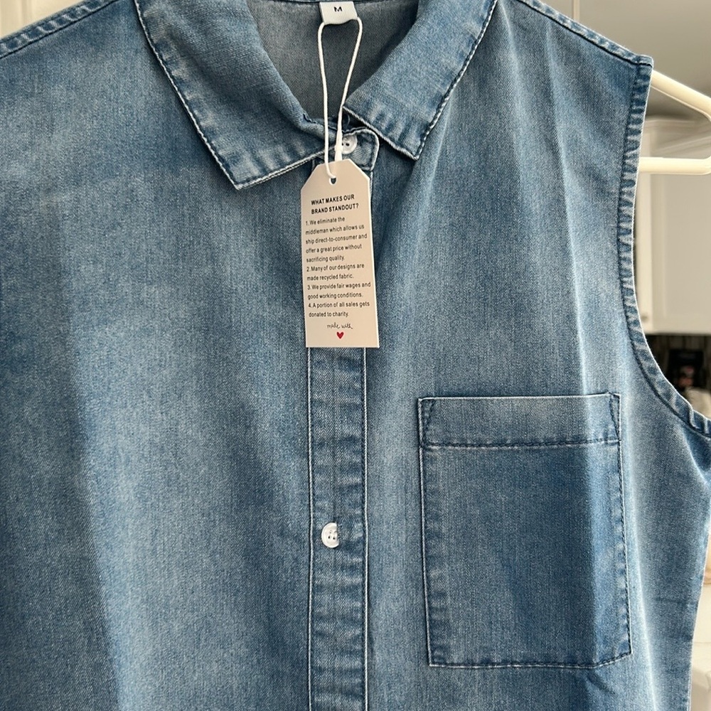 Women’s sleeveless denim dress. Size Medium. A bit snug across the bust line.